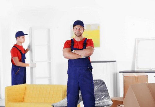 Urgent removals team loading furniture for a same day move in Kentish Town