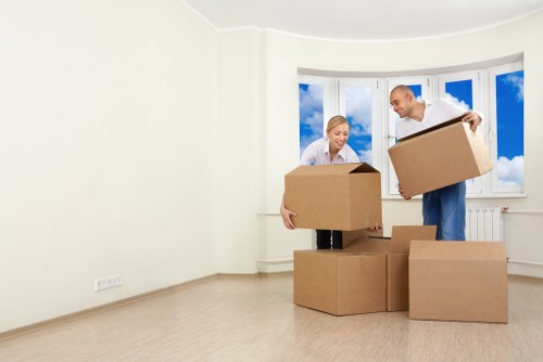 Loading furniture into a van for a Kentish Town move